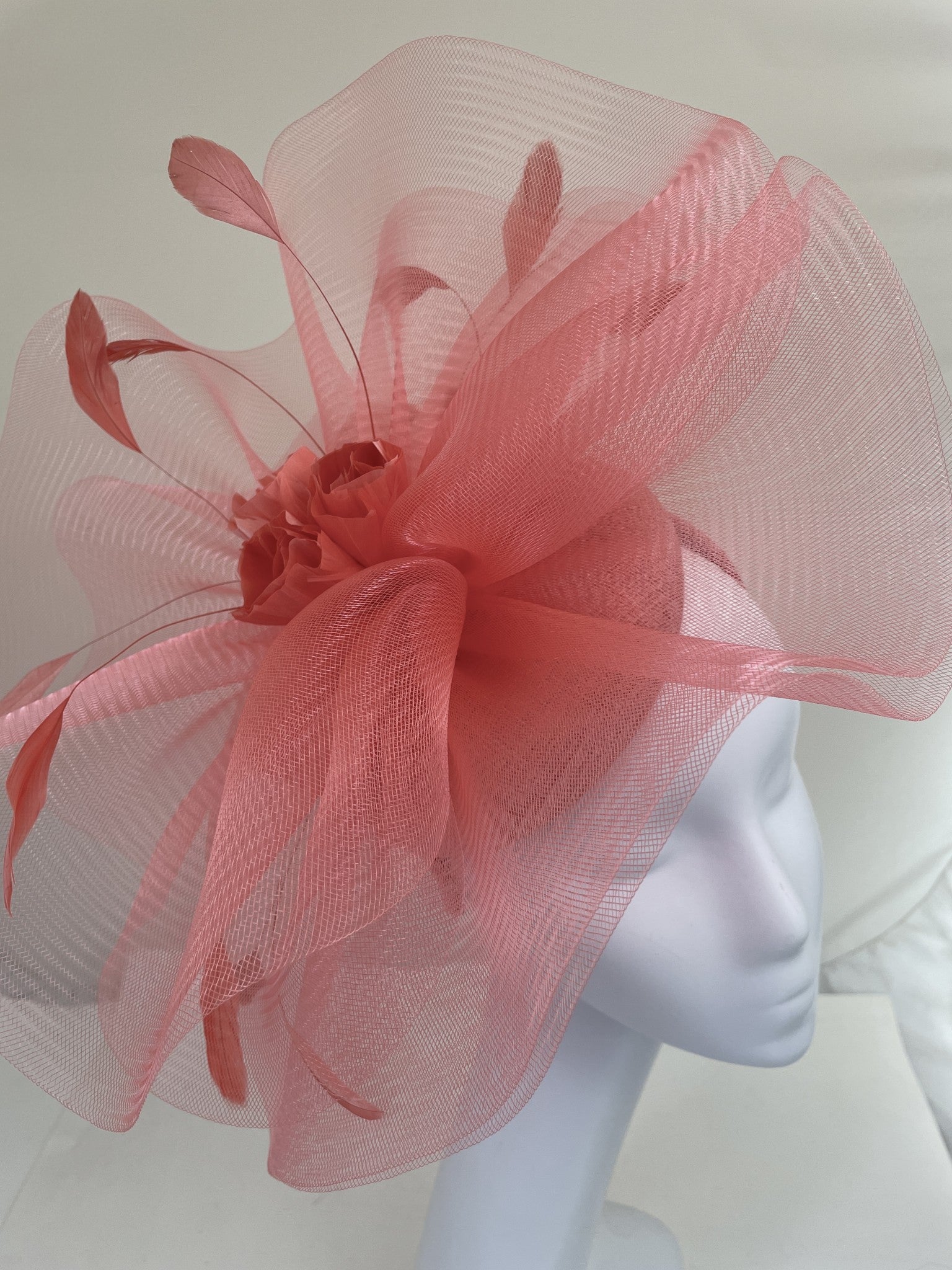 Soxells 2319 coral Fascinator On band