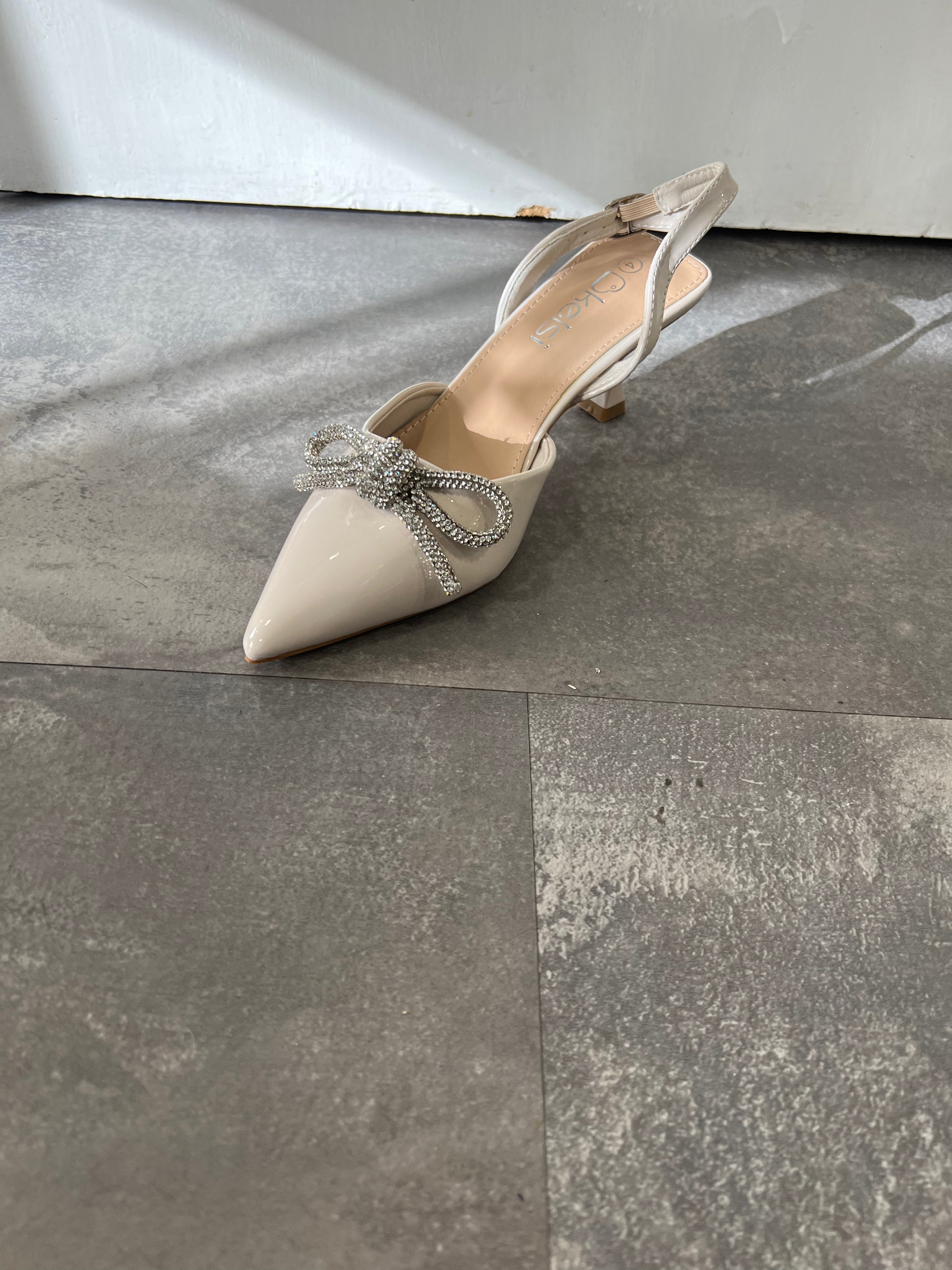 Nude patient bow slingback