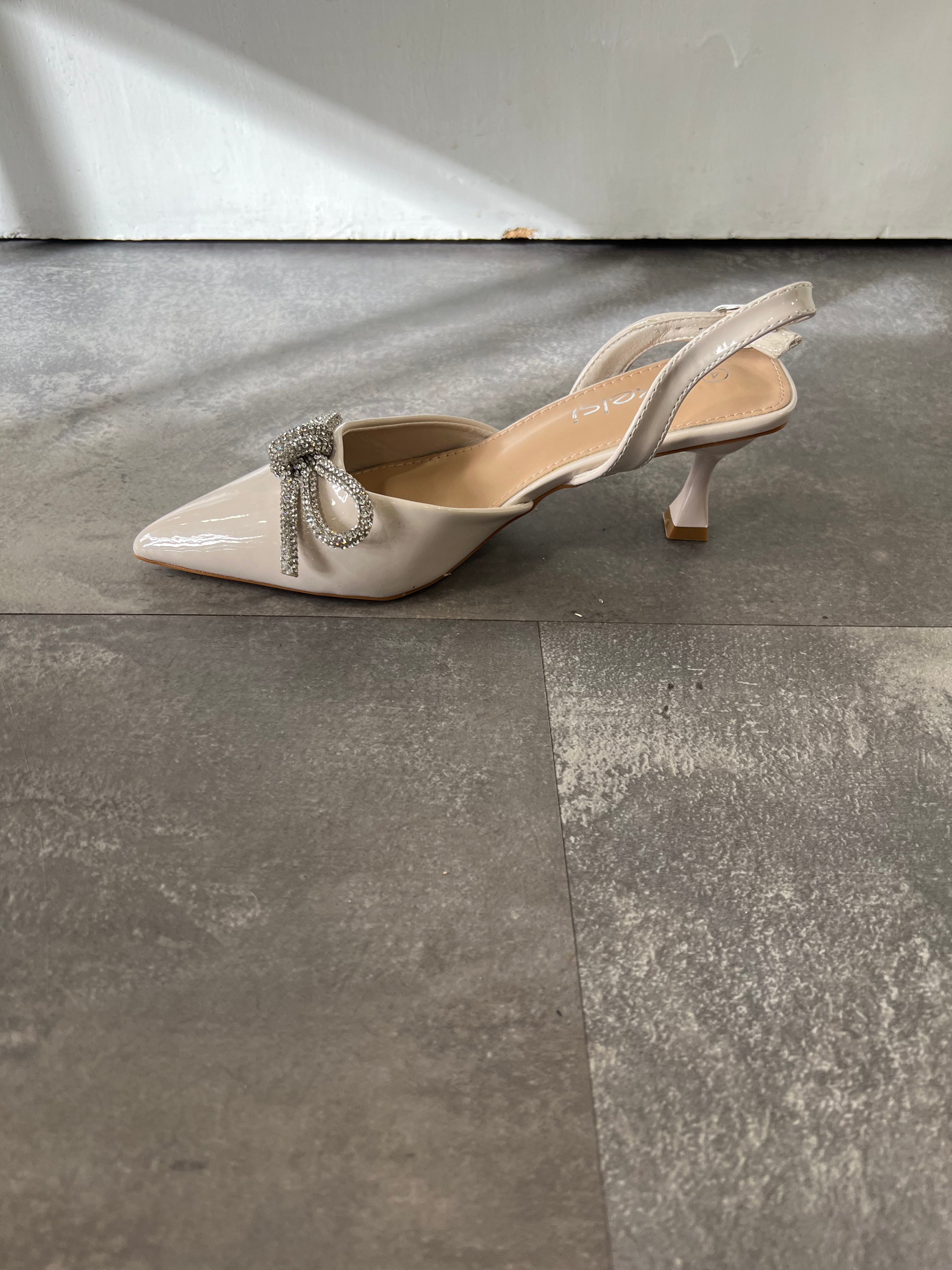 Nude patient bow slingback