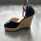 Closed toe high wedge