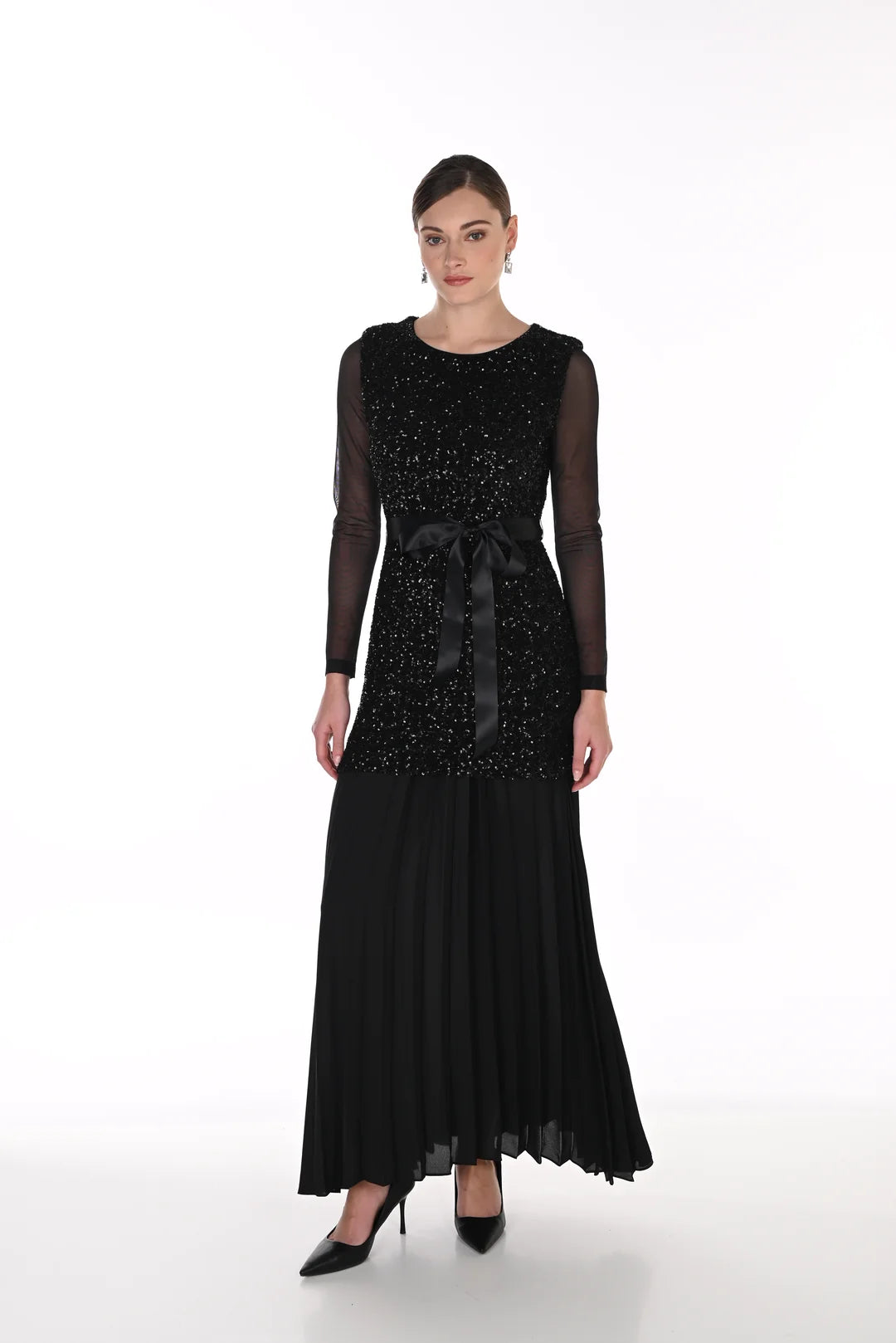 Frank Lyman 269236 Knit Sequin dress with pleated skirt. Black