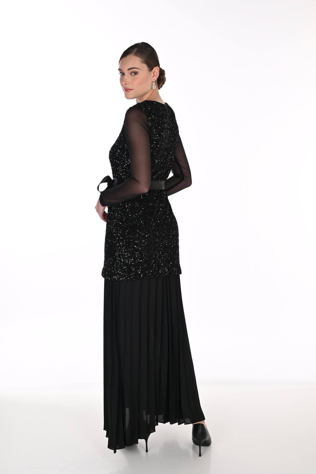 Frank Lyman 269236 Knit Sequin dress with pleated skirt. Black