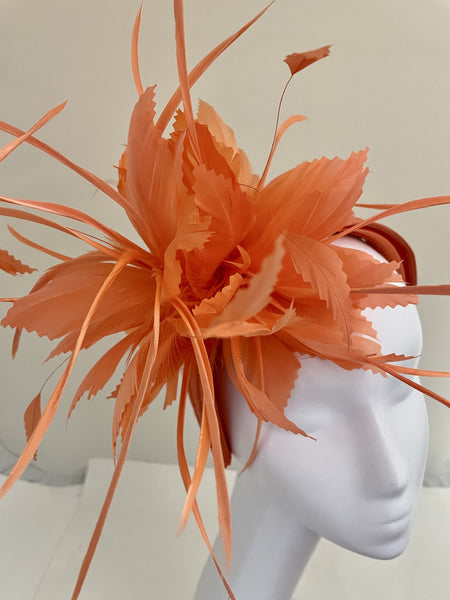 Soxells 2319 coral Fascinator On band